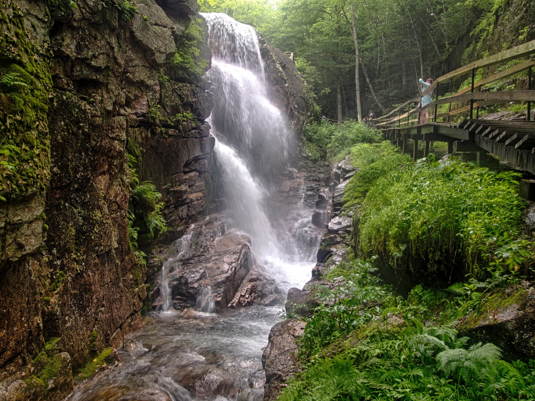 Mountain lake and wooded slopes near Flume Gorge in Franconia Notch.