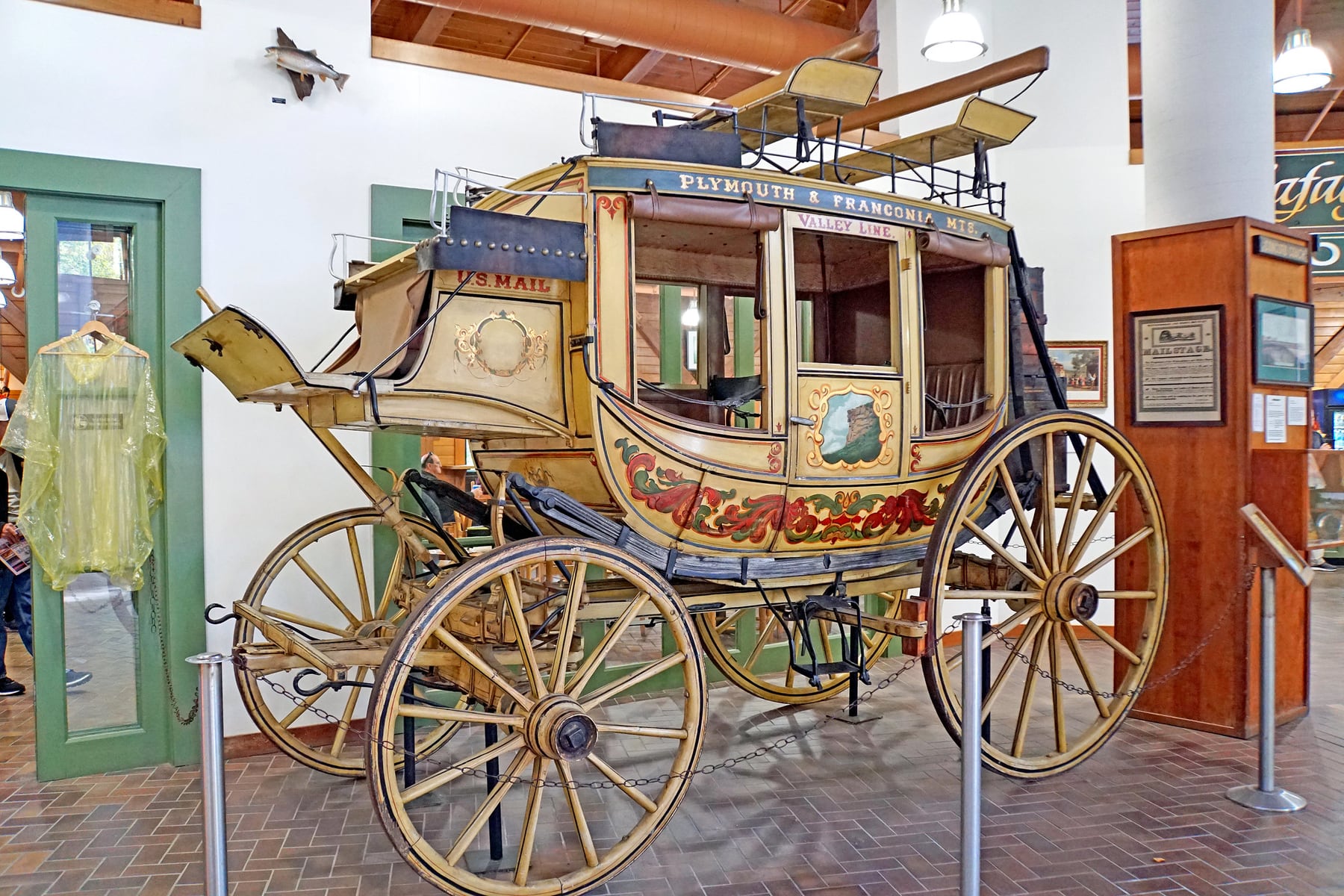 Historic stagecoach exhibit inside the Flume Gorge visitor center in New Hampshire.