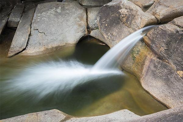 Franconia Falls freshwater swim scene in New Hampshire.
