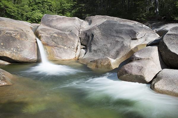 Franconia Falls freshwater swim scene in New Hampshire.