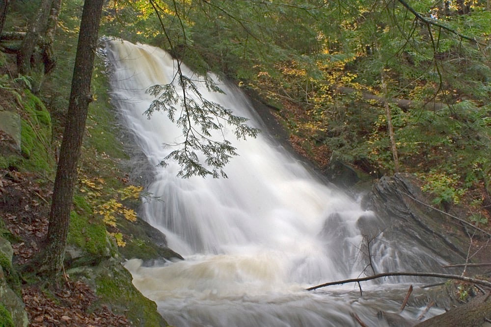 Thundering Brook Falls waterfall scene in Vermont.