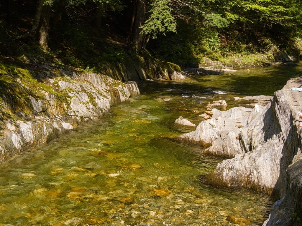 Clear Green Swimming Hole at Warren Falls in Vermont.